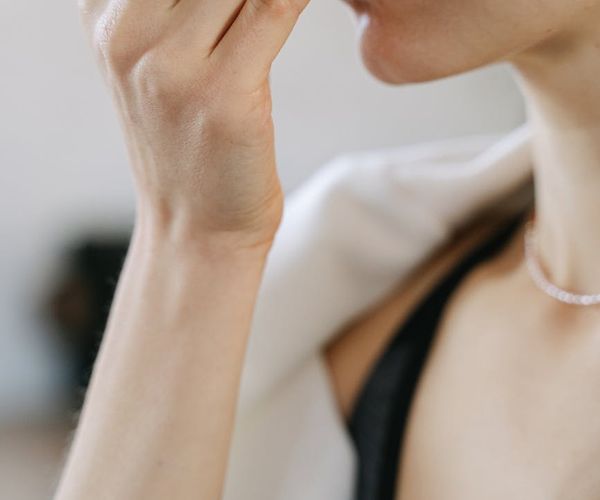 Close-up of hands in a meditative pose.